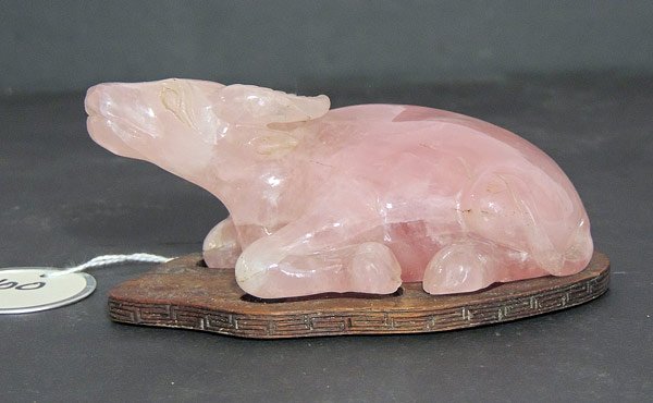 Chinese Rose Jade Water Buffalo: Chinese carved rose jade water buffalo on teak stand. 4-3/4” x 2-1/2” x 2” tall.