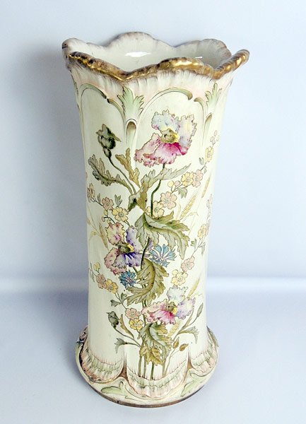 Royal Bonn Porcelain Umbrella Stand: Royal Bonn porcelain umbrella stand with hand painted floral and leaf decoration. 24” tall, 11” diameter.