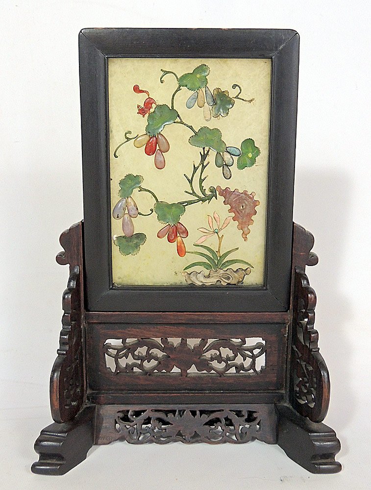 Pair of Chinese Table Screens: Pair of Chinese table screens with hardstone-over-jade panels , on pierced teakwood stands. 12" tall x 7-1/4" wide.
