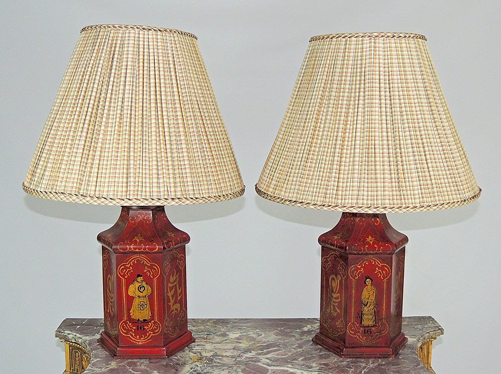 Pair of Tole Painted Lamps: Pair of tole painted lamps in the Chinese tradition, with figural and character decoration on red ground. Bases: 15" tall. Full lamps: 29-1/2" tall.