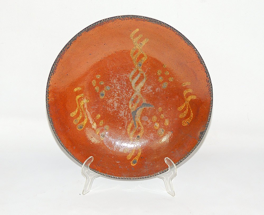 Slipware Plate: Redware plate with yellow slip decoration, coggled rim, 11-1/4" diameter.