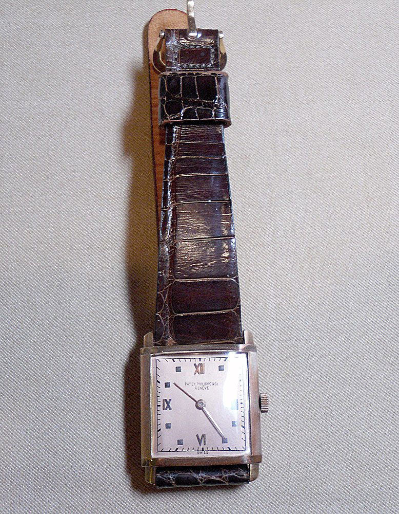 Man's Patek Philippe Wristwatch: Man’s Patek, Philippe & Co wristwatch with 18K yellow gold (marked) case and buckle, brown “Domestic Alligator” band. With Patek, Philippe & Co. box.