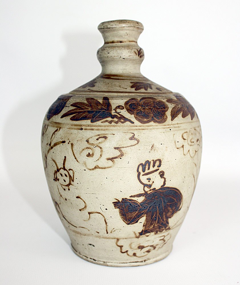 Southeast Asian Pottery Urn: Southeast Asian pottery urn with a folk art decoration surround, and Mathias Komor gallery sticker on base. 7-1/4" tall.