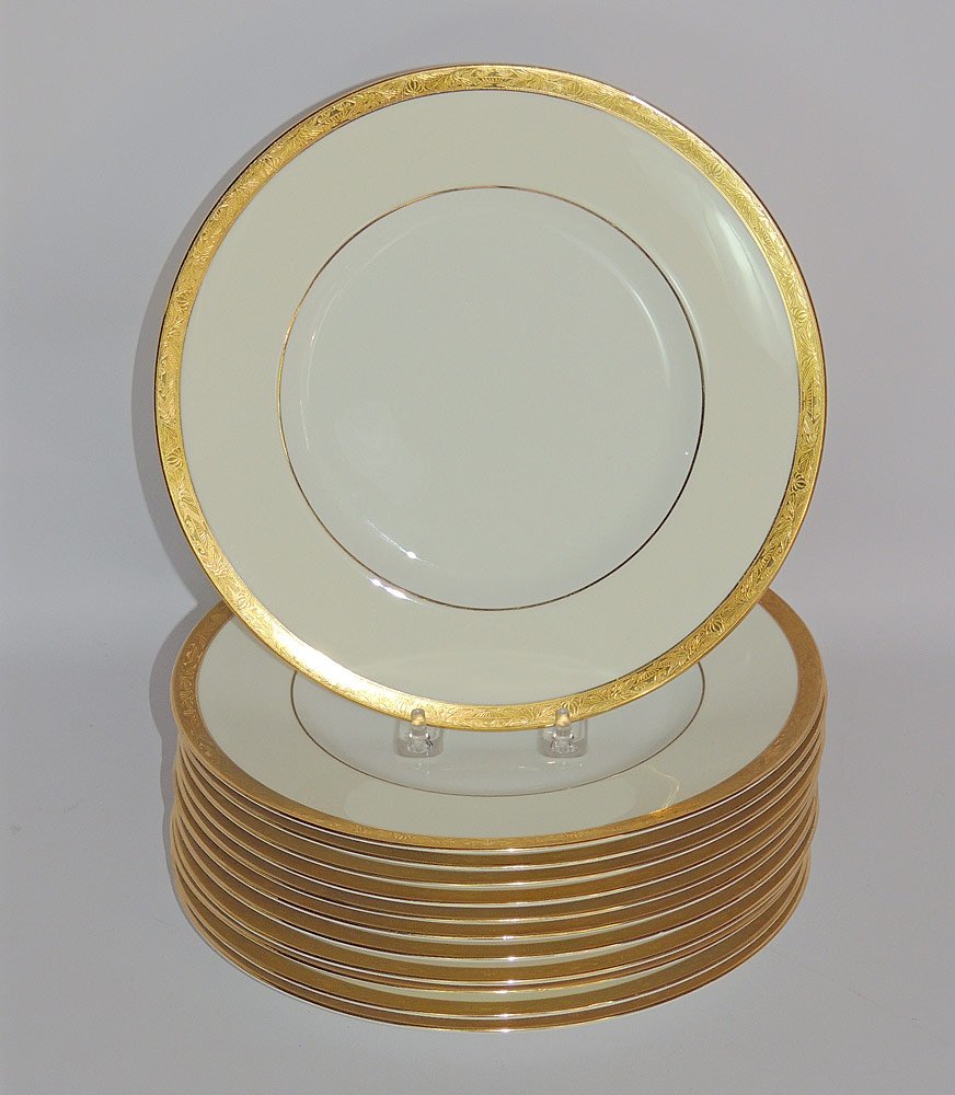 Twelve Minton China Dinner Plates: Set of 12 Minton China dinner plates with etched gilt rim. Retailed by Davis Collamore & Co., New York. 10-1/4" diameter.