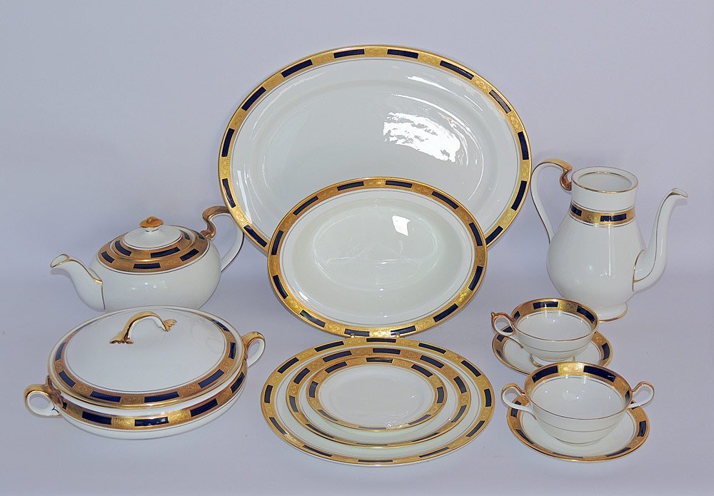 69-Piece Anysley Porcelain Dinner Service: 69-piece Aynsley porcelain dinner service (John Aynsley & Co. London), in "Empress Cobalt" pattern. Service includes: Covered tureen; Tea pot; Coffee pot; Platter; Vegetable bowl; 10 Entrèe plates; 1