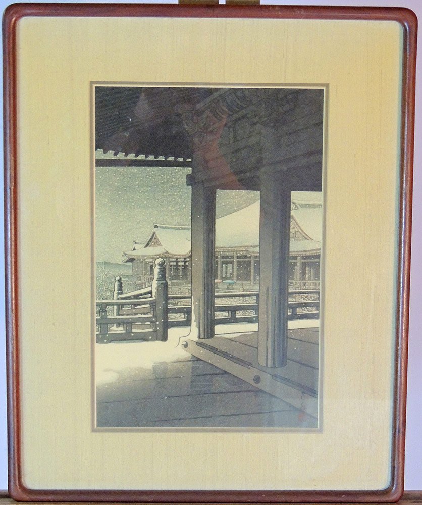 Kawase Hasui Woodblock.: Kawase Hasui. Woodblock titled, "Evening Snow at Kizomizu". Framed under glass with Gilbert Luber Gallery, Philadelphia tag. 14" x 9-1/4".