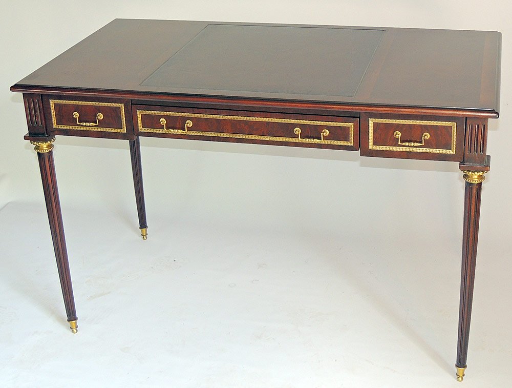 Theodore Alexander Writing Desk: Theodore Alexander writing desk. Louis XVI-style with inset tooled leather writing surface, on brass-mounted, tapered legs. 29-1/2" tall, 46" wide, 26" deep.