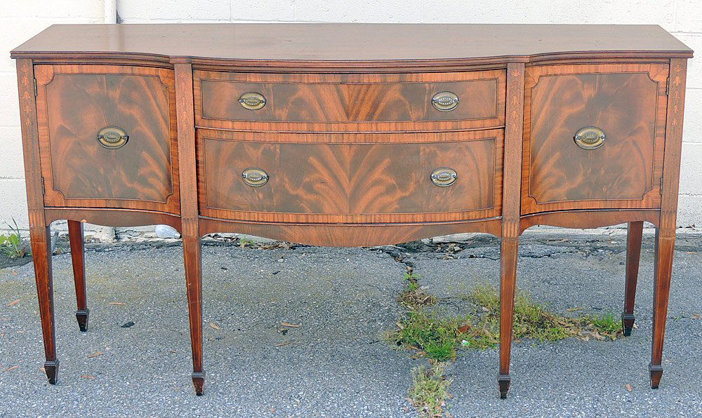Kittinger Inlaid Sideboard: Kittinger Inlaid mahogany sideboard with bellflower inlay and Kittinger label inside interior drawer. 38" tall, 69" wide, 22-1/2" deep.
