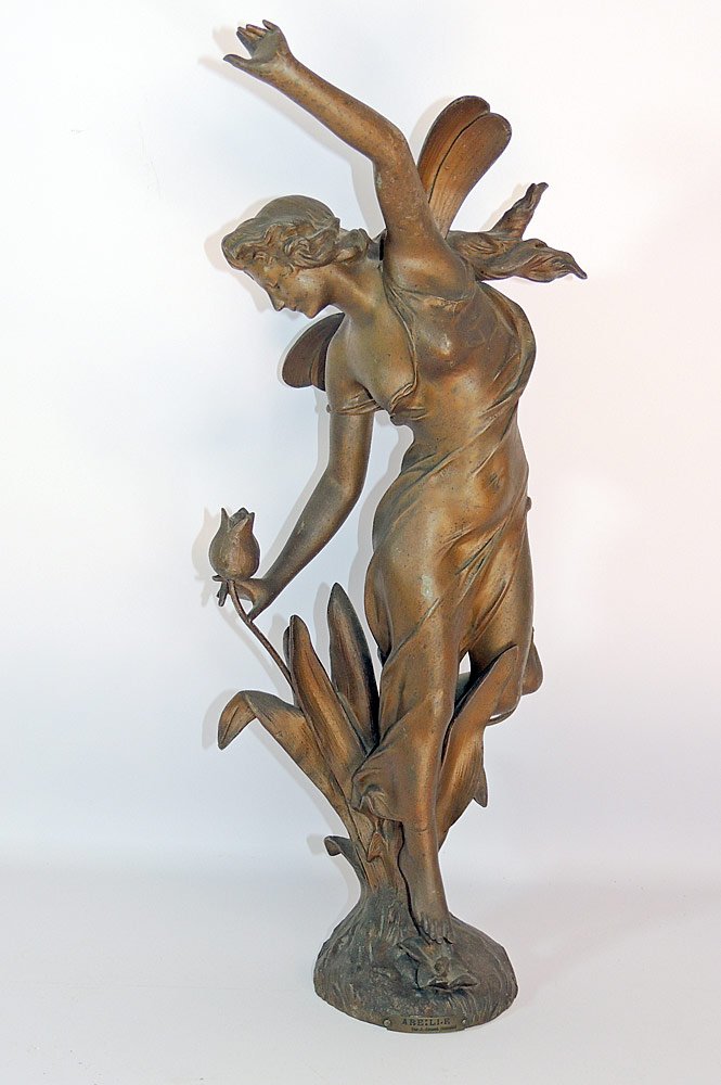 Spelter Figure, After Julien Causse: After Julien Causse (French 1869-1914). Spelter figure, "A Belle". Plaque on front and signed "J. Causse". 23-1/3" tall.