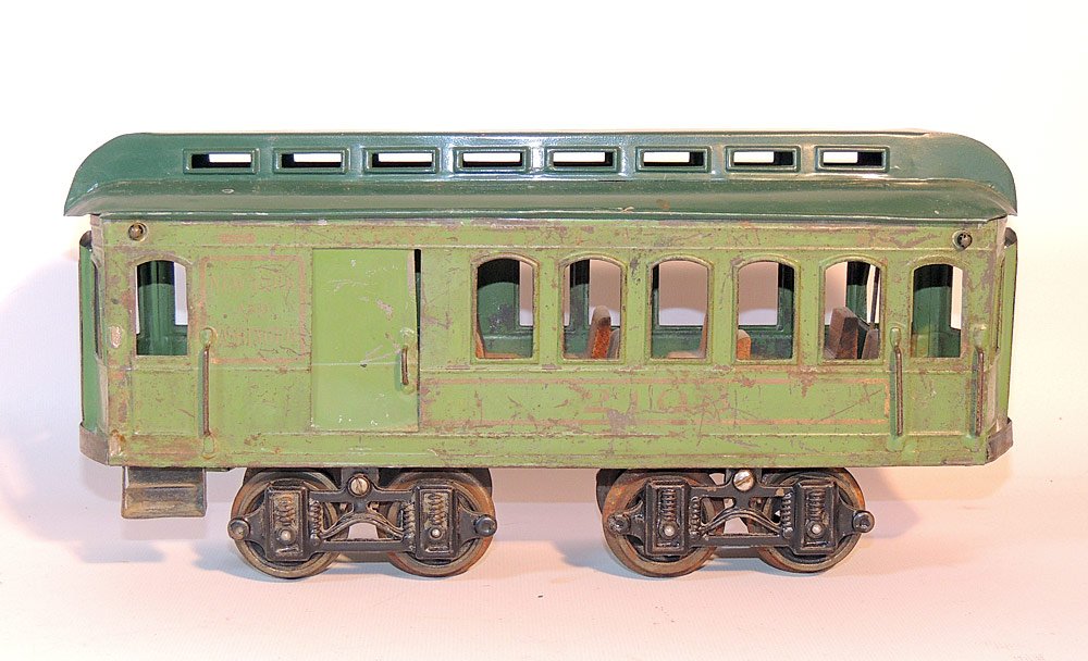 Voltamp No. 2103 Passenger Car: With two-tone green and gold graphics. Interior seats. 12-3/4" long.