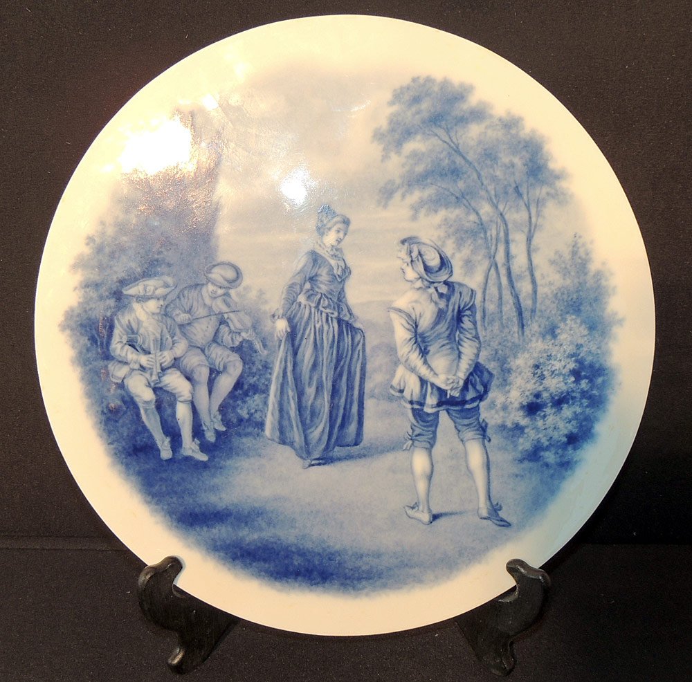 KPM Porcelain Charger: Blue and white genre scene. Impressed KPM on underside.13-3/4" diameter.