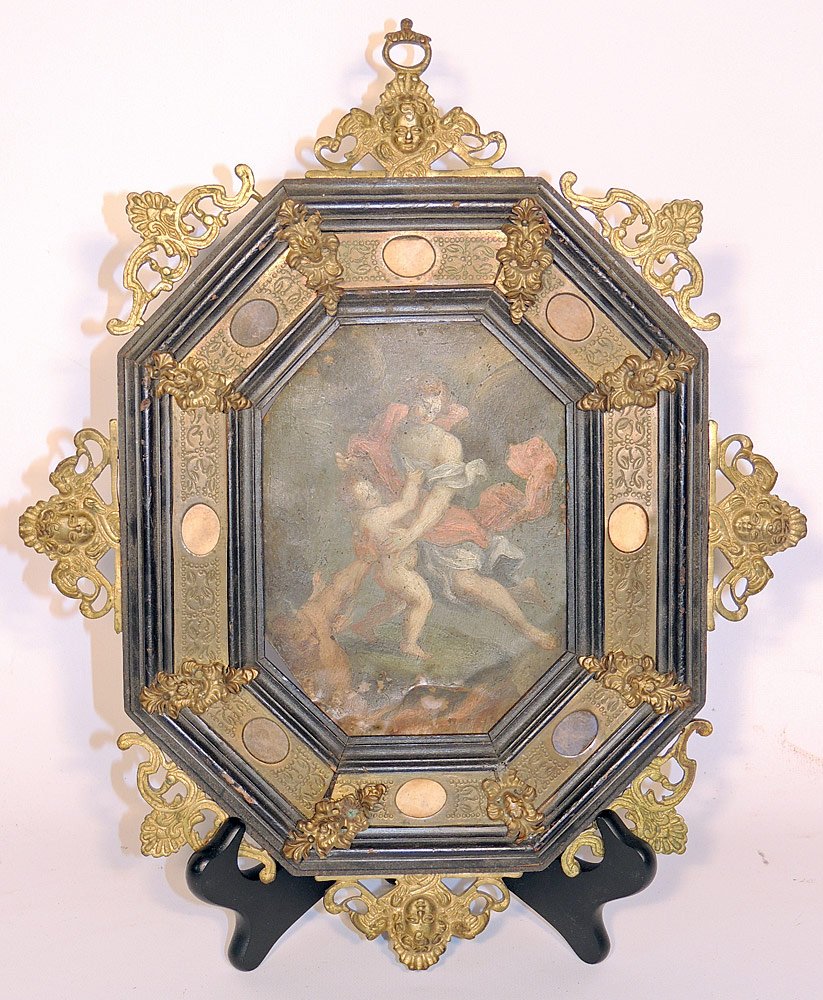 Hand-painted Oil on Copper Icon: Depicting an angel rescuing a child from the devil. Mounted in a wood frame with copper accents and ormolu mask mounts. Copper: 6-1/2" tall x 5" wide. Frame: 15" tall x 12" wide.