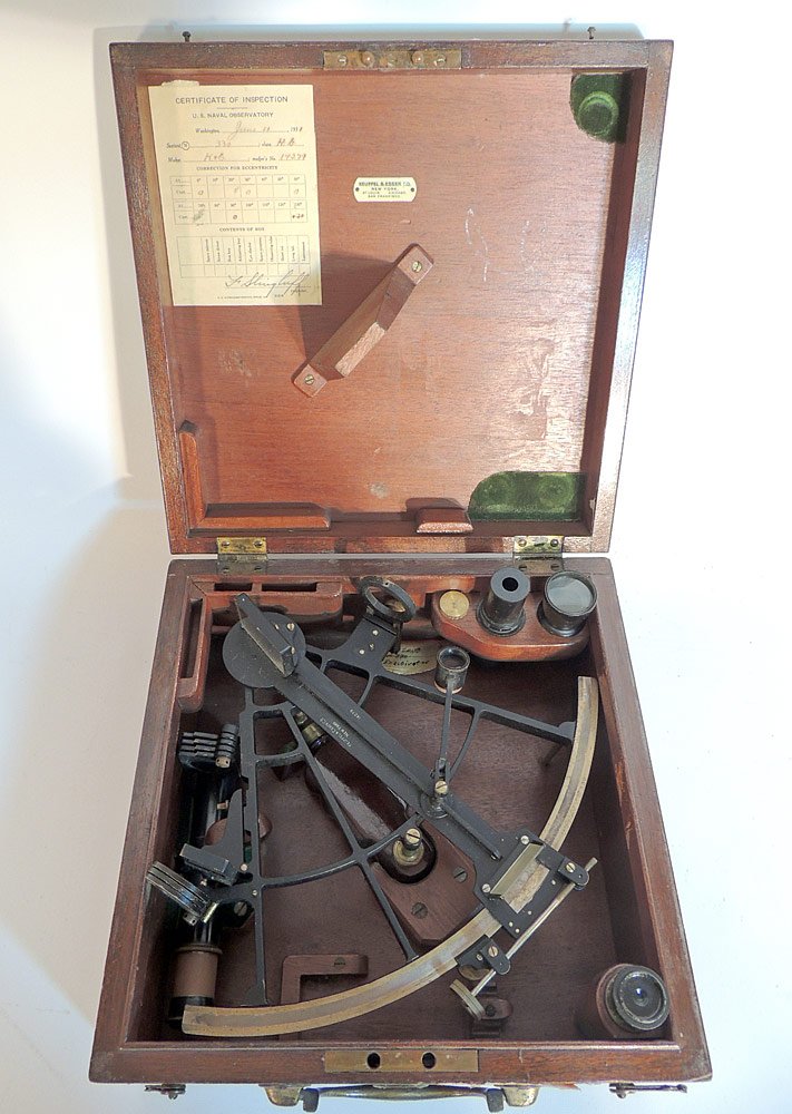 Keuffel and Esser Co. Naval Sextant: Keuffel and Esser Co. cast iron and brass Naval sextant. Serial #14279. In a fitted mahogany case with brass plaque engraved U.S. Navy No 330. Case: 5-1/2 in. tall, 11-1/4 in. wide, 11-1/4 in. deep.