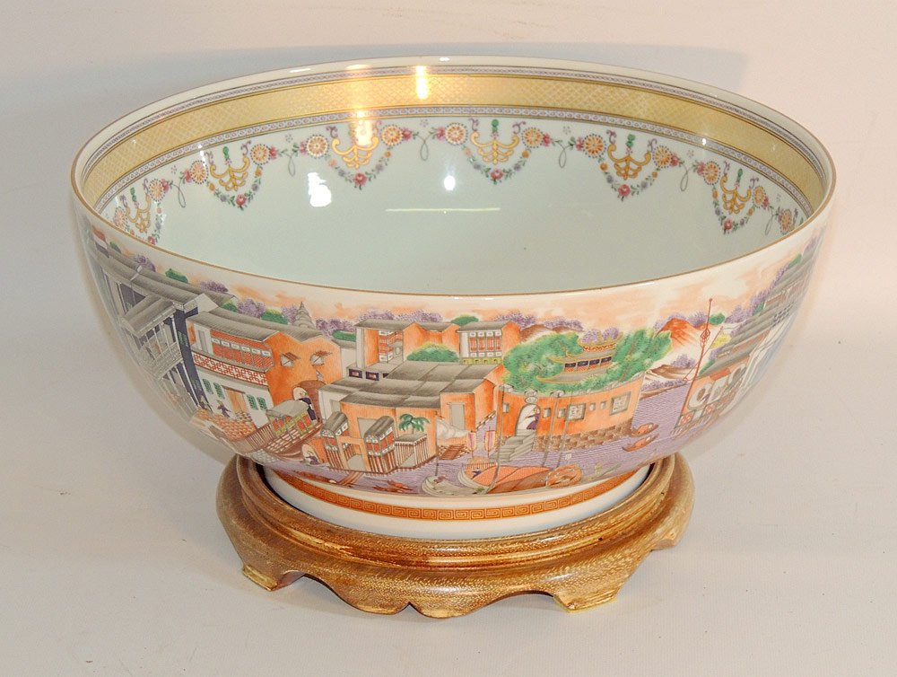 Mottahedeh Chinese Export Style Punch Bowl: Mottahedeh Chinese export style porcelain punch bowl. Winterthur reproduction. Decorated with the thriteen Western Hongs. Interior with urn and floral decoration. On hardwood stand. Bowl: 6-1/4" tall 