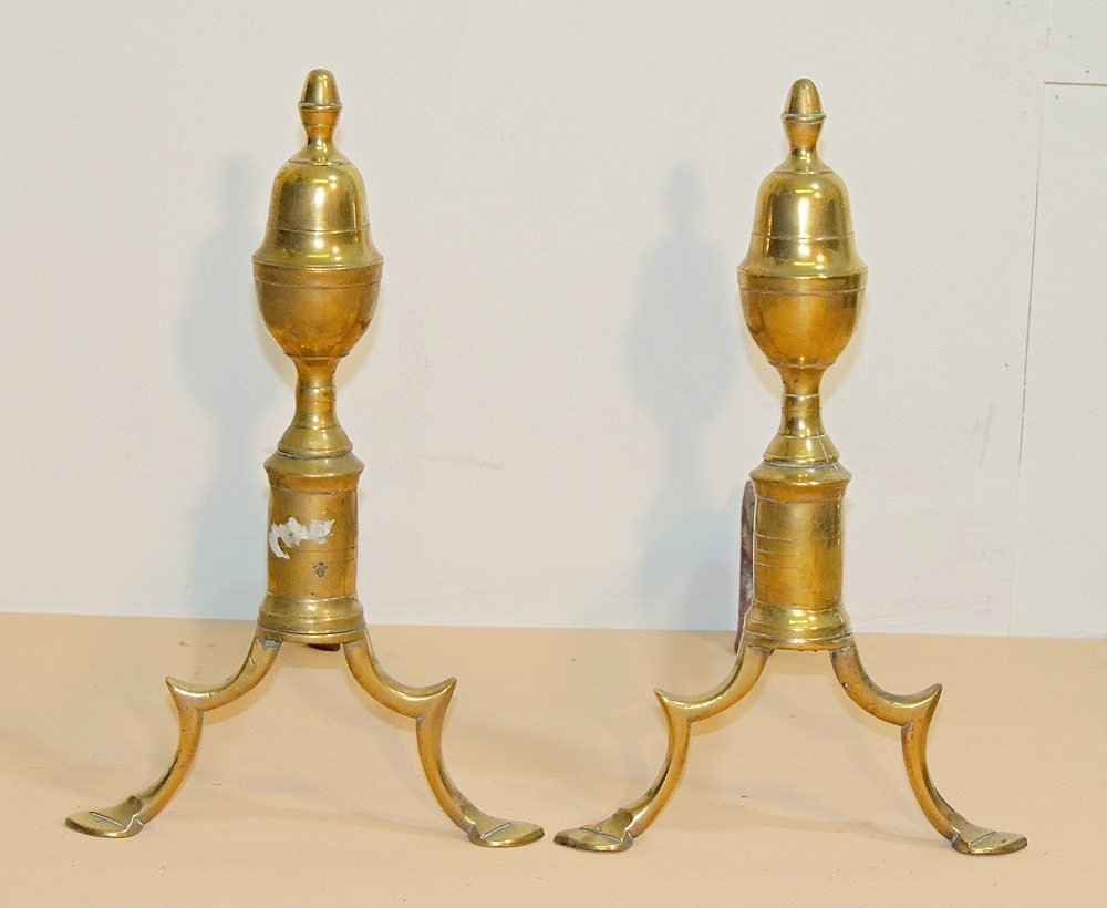 American Brass Andirons: American brass andirons. Ca. 1800. Possibly Philadelphia. With spade feet. 14" tall x 9" wide.