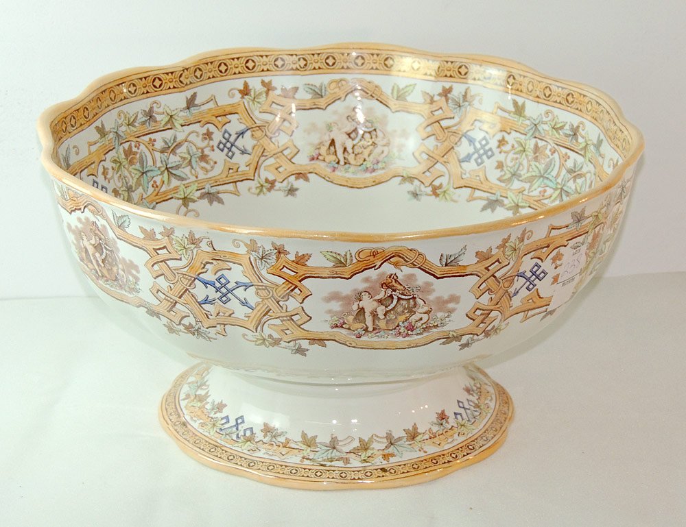 English Ironstone Punch Bowl: English ironstone punch bowl with Furnival "rustic" transferware decoration. Marked on base. 9 in tall, 17-1/2 in diameter.