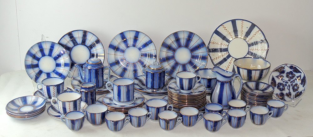 73-Pcs. of Flow Blue Porcelain: Collection of 73 pieces of gaudy flow blue porcelain, most in wagon wheel pattern.