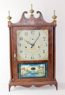 Seth Thomas Pillar and Scroll Clock: Seth Thomas Sheraton mahogany pillar and scroll shelf clock. 19th Century. With wooden works, hand painted wood dial, and reverse-painted glass panel. 27-1/2 x 17 in.