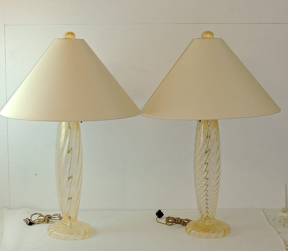 Pair of Donghia Murano Glass Table Lamps: Pair of Donghia Murano glass table lamps signed by John Hutton, with gold-fleck swirl-design lamp bases Height of Bases: 20 in. Height of entire lamp: 31 in.