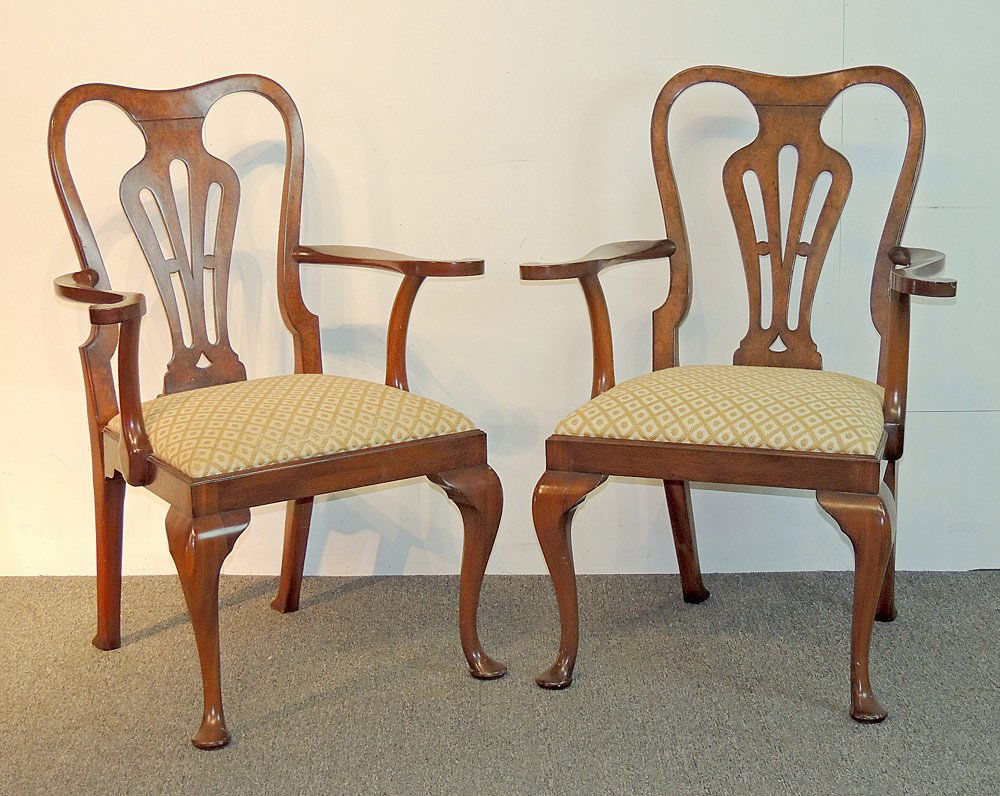 Pair of Smith & Watson Queen Anne-style Arm Chairs: A pair of Queen Anne-style arm chairs by cabinetmaker Smith & Watson, New York. H: 40 in. W: 29-1/2 in. D: 20-1/2 in.