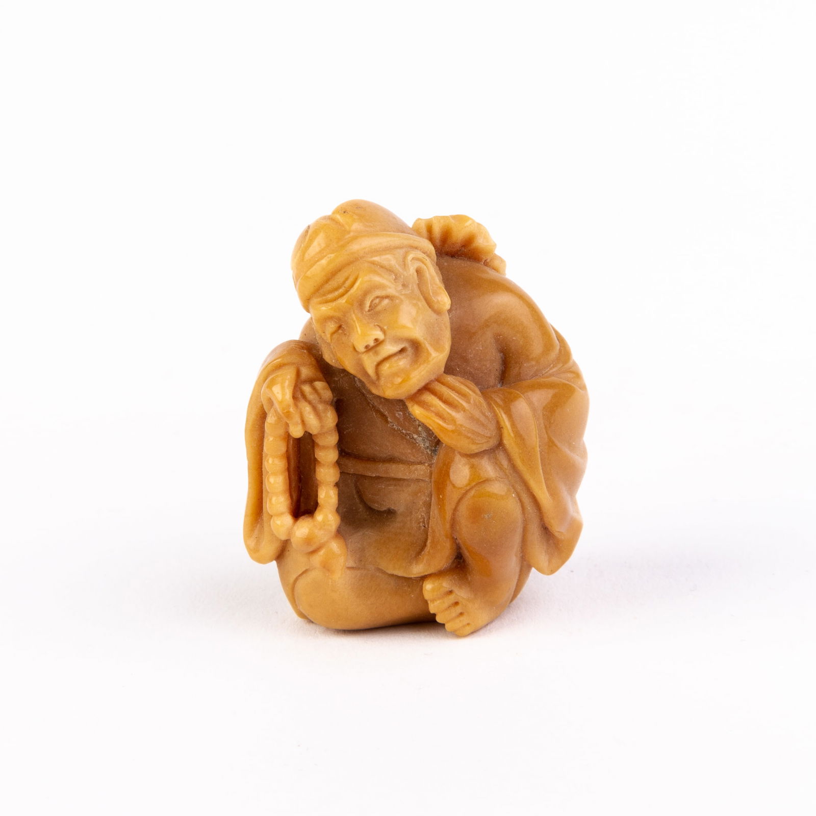 Japanese Carved Tagua Nut Netsuke Inro of a Merchant (1 of 5)