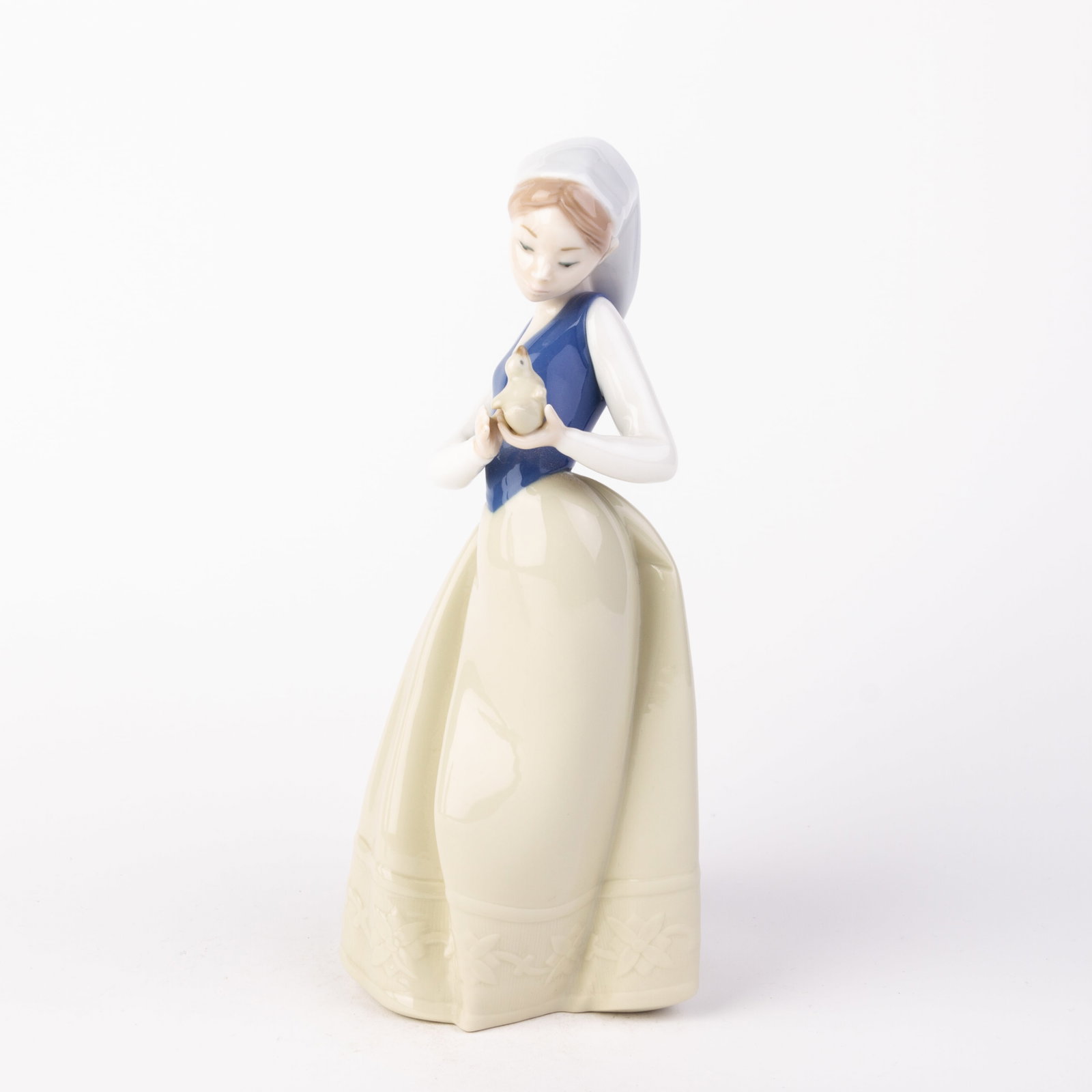Nao Lladro Fine Porcelain Girl with Bird Figure: DIMENSIONS APPROX 28x13x11CM.