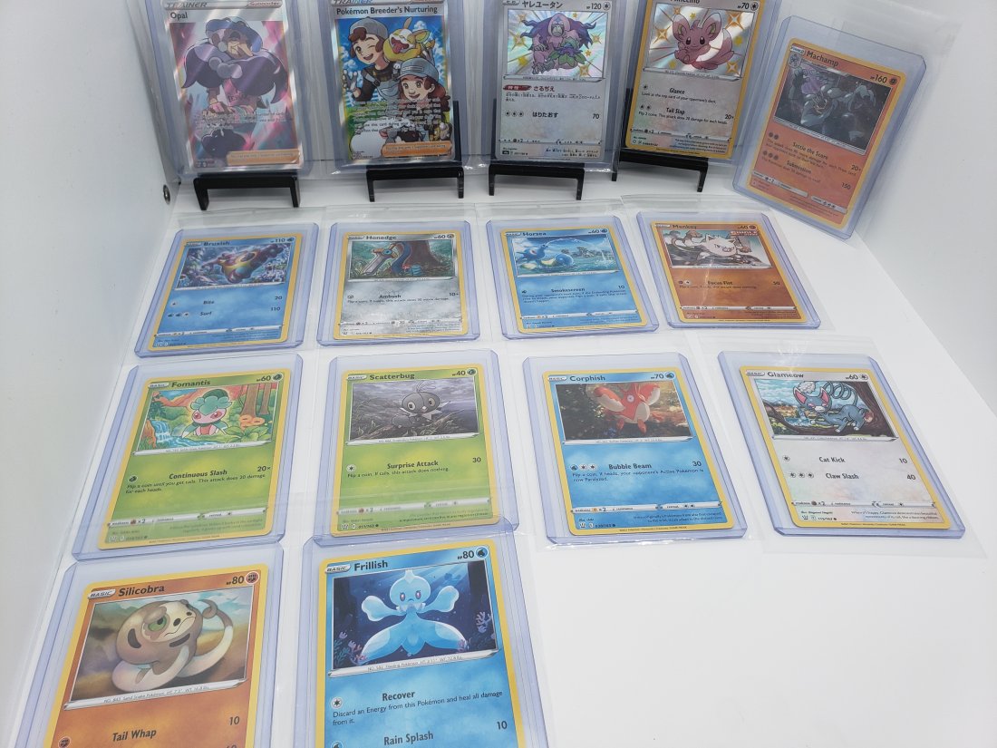 (15) TCG Pokémon Opal Pokémon Breeder's Nurturing Japanese: * 15 Pokémon cards from various sets and years. * As you see some are Japanese and English* There's some baby shines, full arts, holos* Some other cards are great for master sets or playing decks.