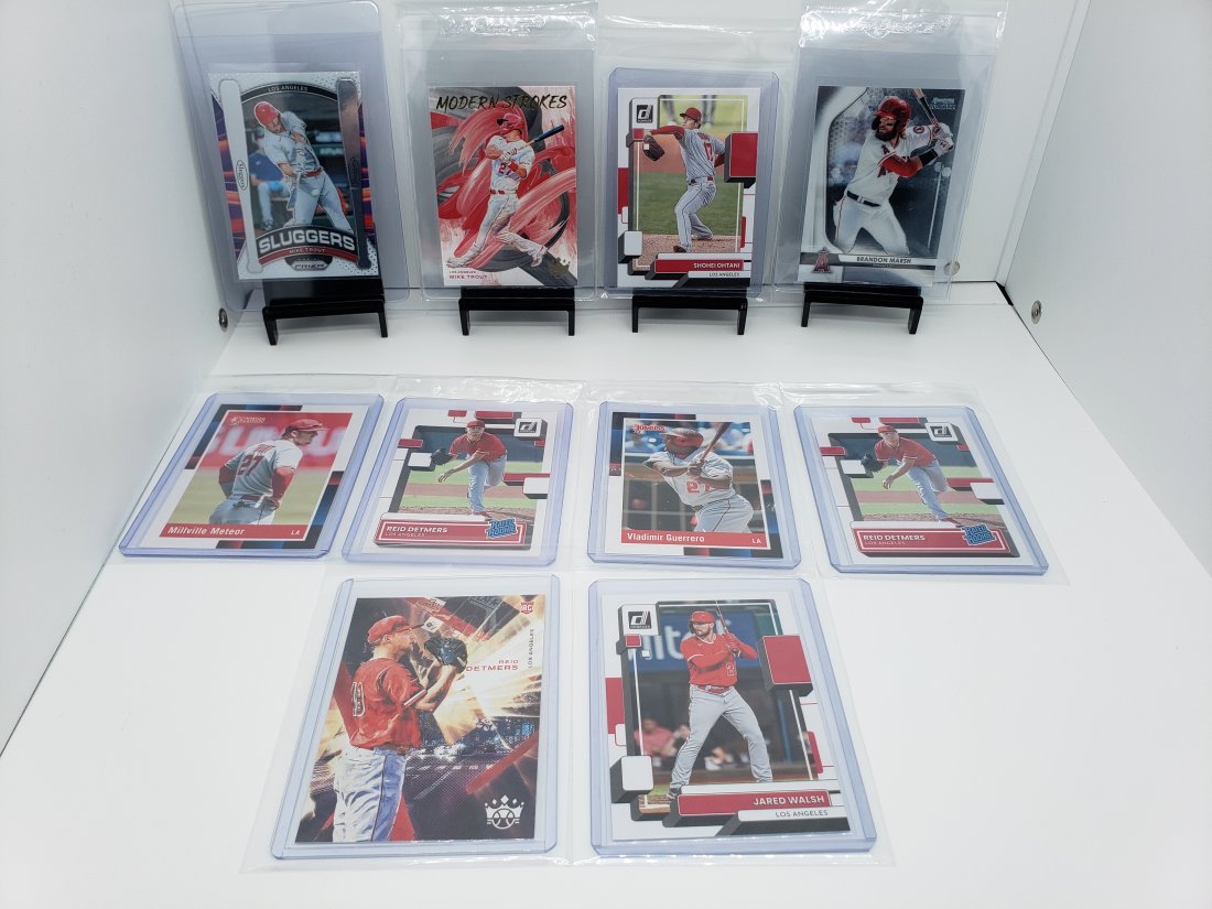 (10) Baseball Angels Mike Trout Shohei Ohtani Reid Detmers: * Various Los Angeles Angels players from various sets and years* There's a SP Short Print of Mike Trout with the Millville Meteor * Rated Rookie's of Reid Detmers