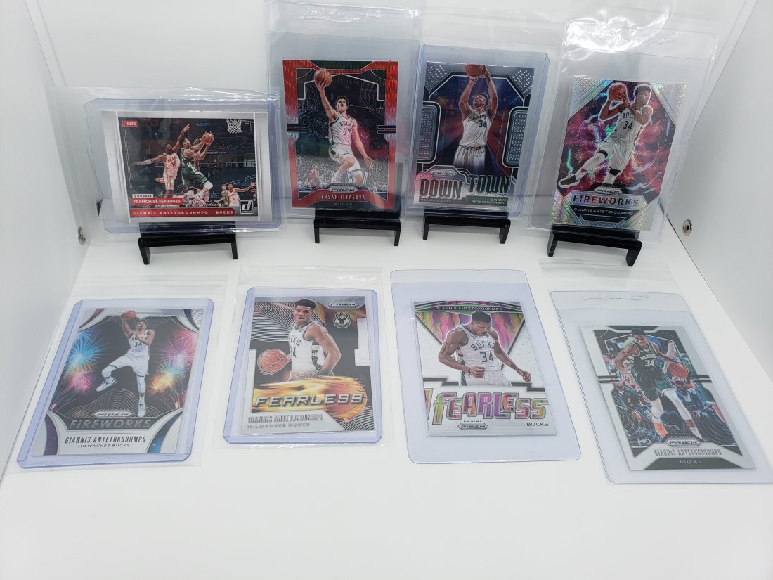 (8) Basketball Bucks Giannis Antetokounmpo: * Various Milwaukee players from different sets and years. * Ersan Ilyasova is a SP Short Print out of Prizm* Prizm Fireworks of Giannis is a hyper silver Prizm