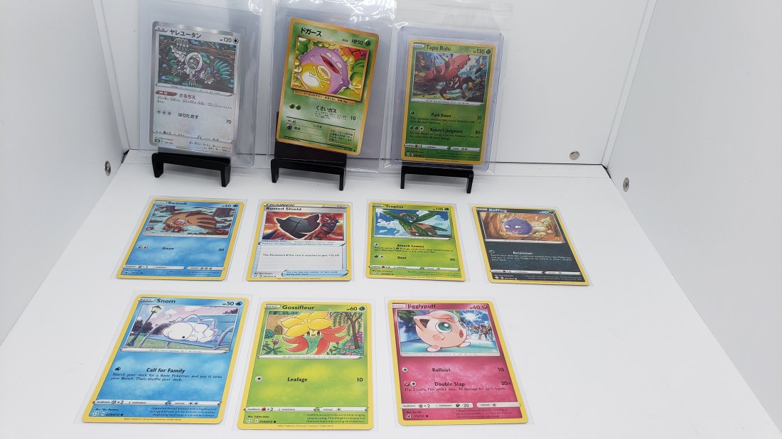 (10) TCG Pokemon Japanese, Vintage, Reverse Holo: * 10 various pokemon cards from various sets and years. * Add to your playing decks or complete your master set. * Oranguru Japanese * Koffing Japanese * Tapu Bulu Reverse Holo