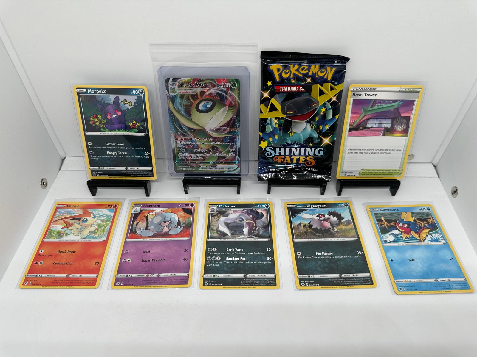 (9) TCG Pokemon Shining Fates pack, Celebi Vmax, Japanese: * (8) TCG Pokemon cards from various sets and years. Add to your playing decks or complete your master sets. * Shining Fates pack sealed * Celebi Vmax Japanese * Morpeko & more.