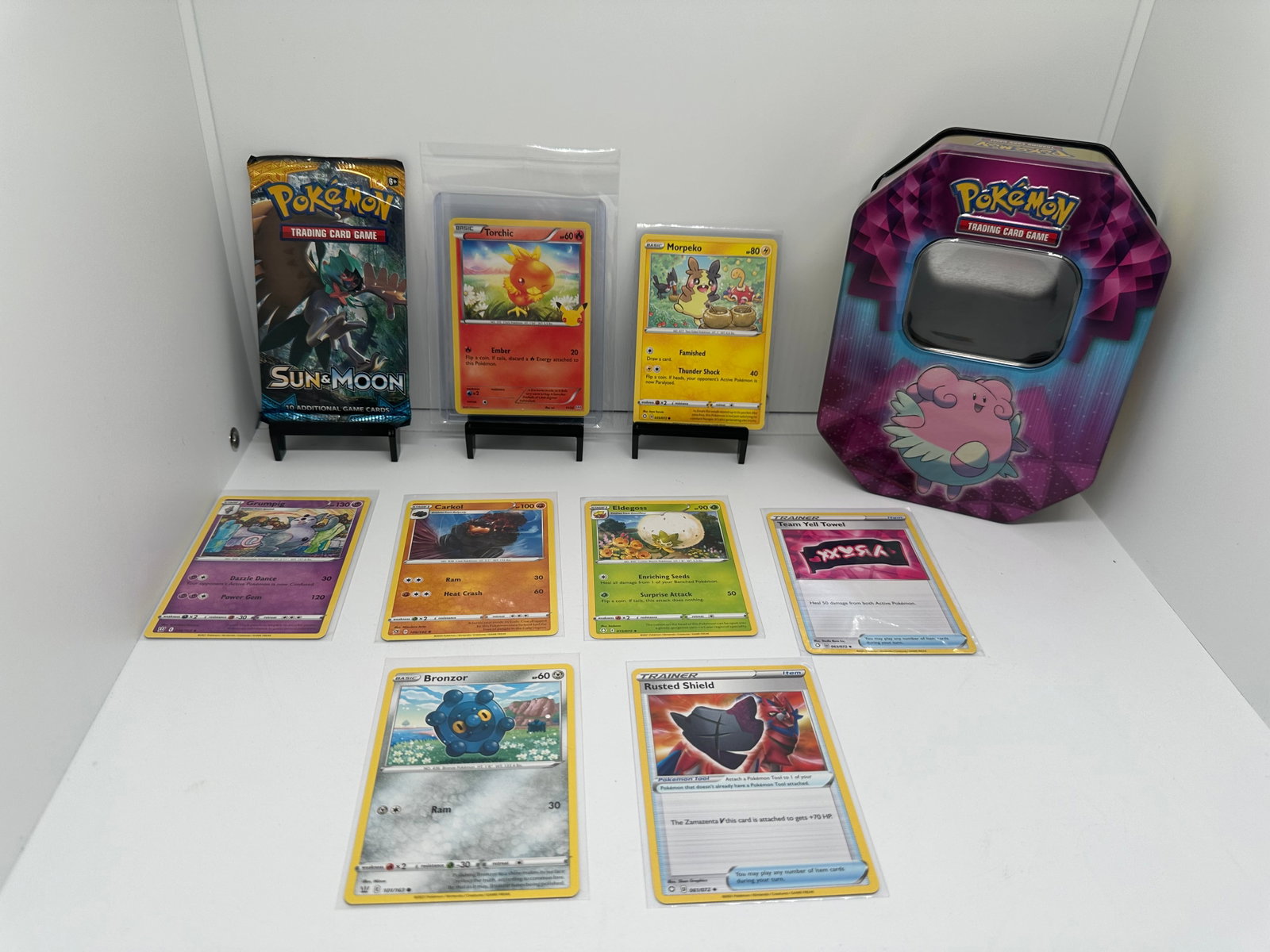 (10) TCG Pokemon Sun & Moon pack, McDonalds, Morpeko: (8) TCG Pokemon cards from various sets and years. Add to your playing decks or complete your master sets. * Sun & Moon base pack sealed * Torchic McDonalds 25th anniversary * Morpeko * Blissey Tin em