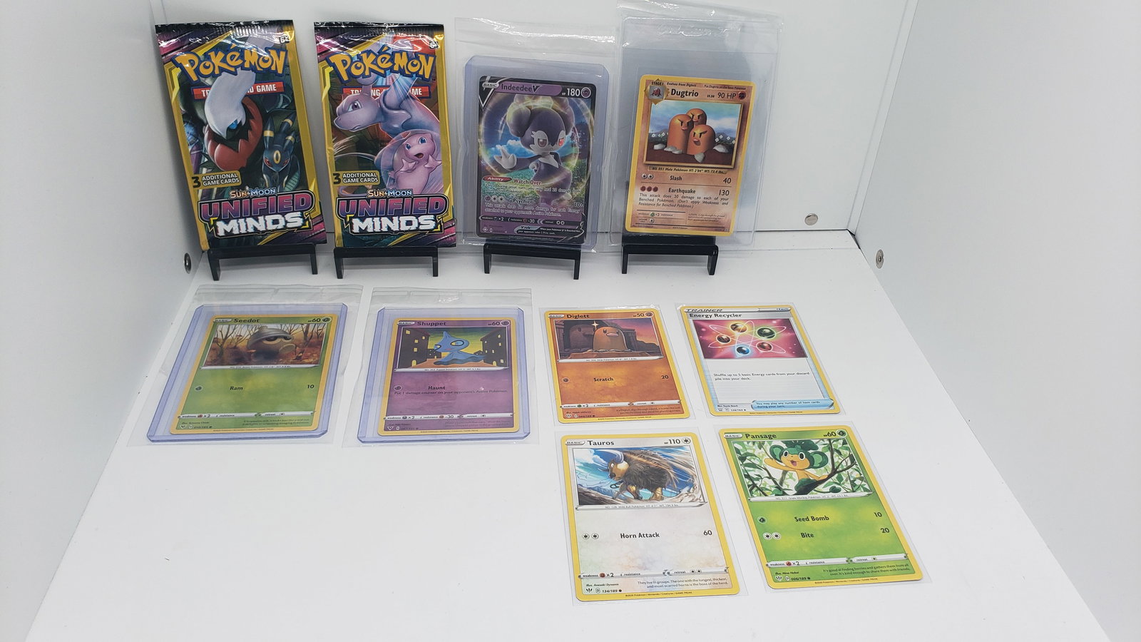 (10) TCG Pokemon Unified Minds packs, V, Evolutions (1 of 6)