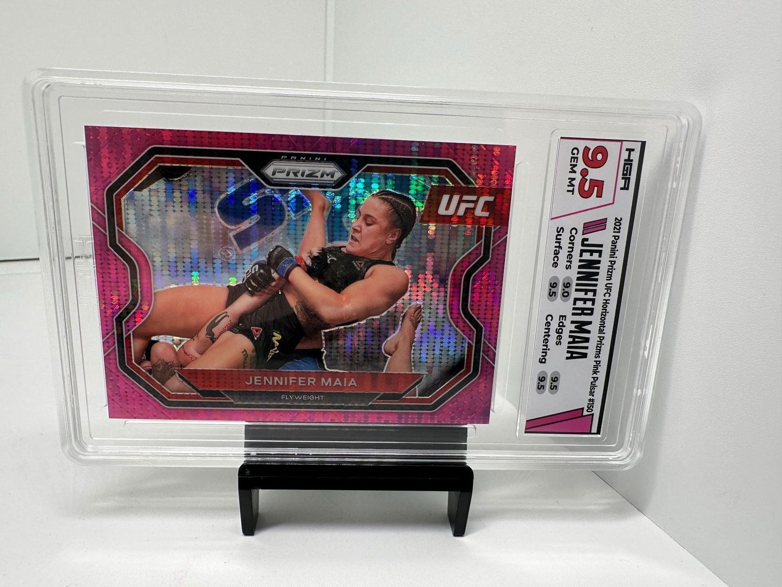 Jennifer Maia #d /42 HGA 9.5 UFC: 2021 Prizm UFC ( Debut Prizm UFC) HGA 9.5 with subgrades Jennifer Maia Horizontal Pink Pulsar #d 34/42