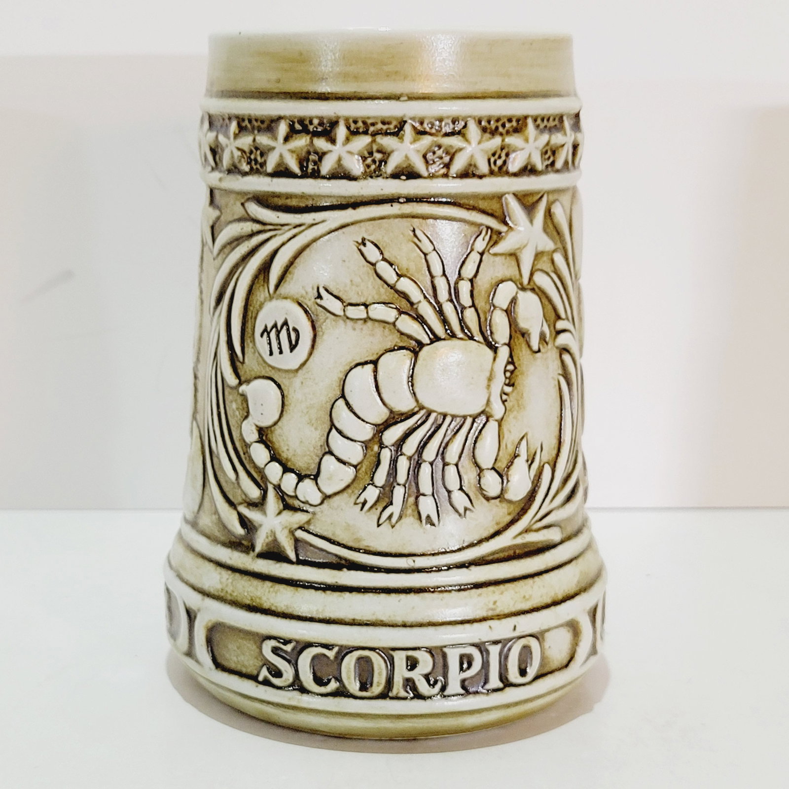 The Zodiac Collection, Ceramarte Brazilian Beer Stein, Scorpio: 5.75" Stoneware in relief with Scorpio astrological symbol, circa 1980's