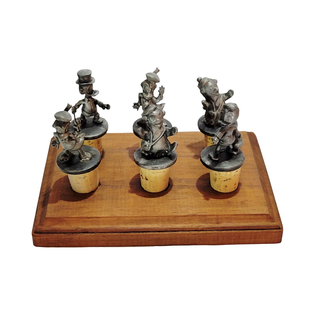 Bottle Stoppers, Disney Bottle Stoppers, Set of Six Disney Character Bottle Stoppers: Each bottle stopper is 3 1/4" tall by 1 1/4" wide solid pewter character with cork base, wood frame is 7" wide by 5" deep, circa modern