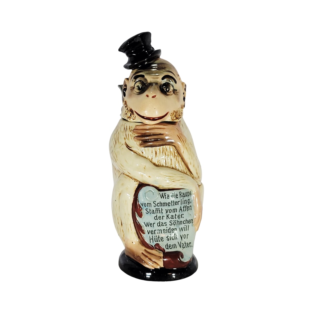 Reinhold Hanke Stein #1261, German Character Beer Stein, Monkey with Top Hat: 1/2 Liter pottery character stein with pottery figural lid, Text - As the caterpillar comes from the butterfly, from the monkey comes the tomcat, who wants to prevent the little son should avoid the f