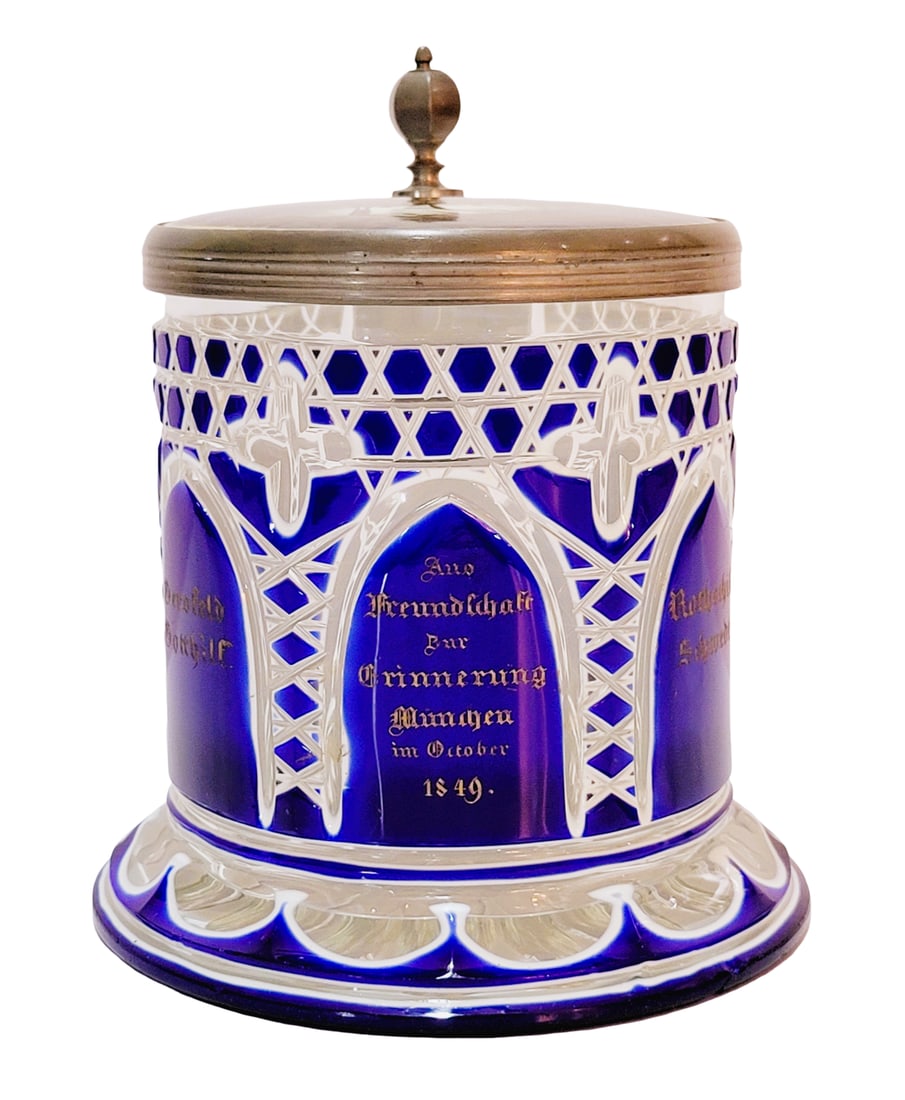 Bohemian Stein, German Beer Stein, Double Overlay Stein: 1.0 Liter blown double overlay of cobalt over white over clear colorless glass with flared stared and oval cut base showing scalloped wheel cuts between horizontal cuts, the cylindrical body with nume