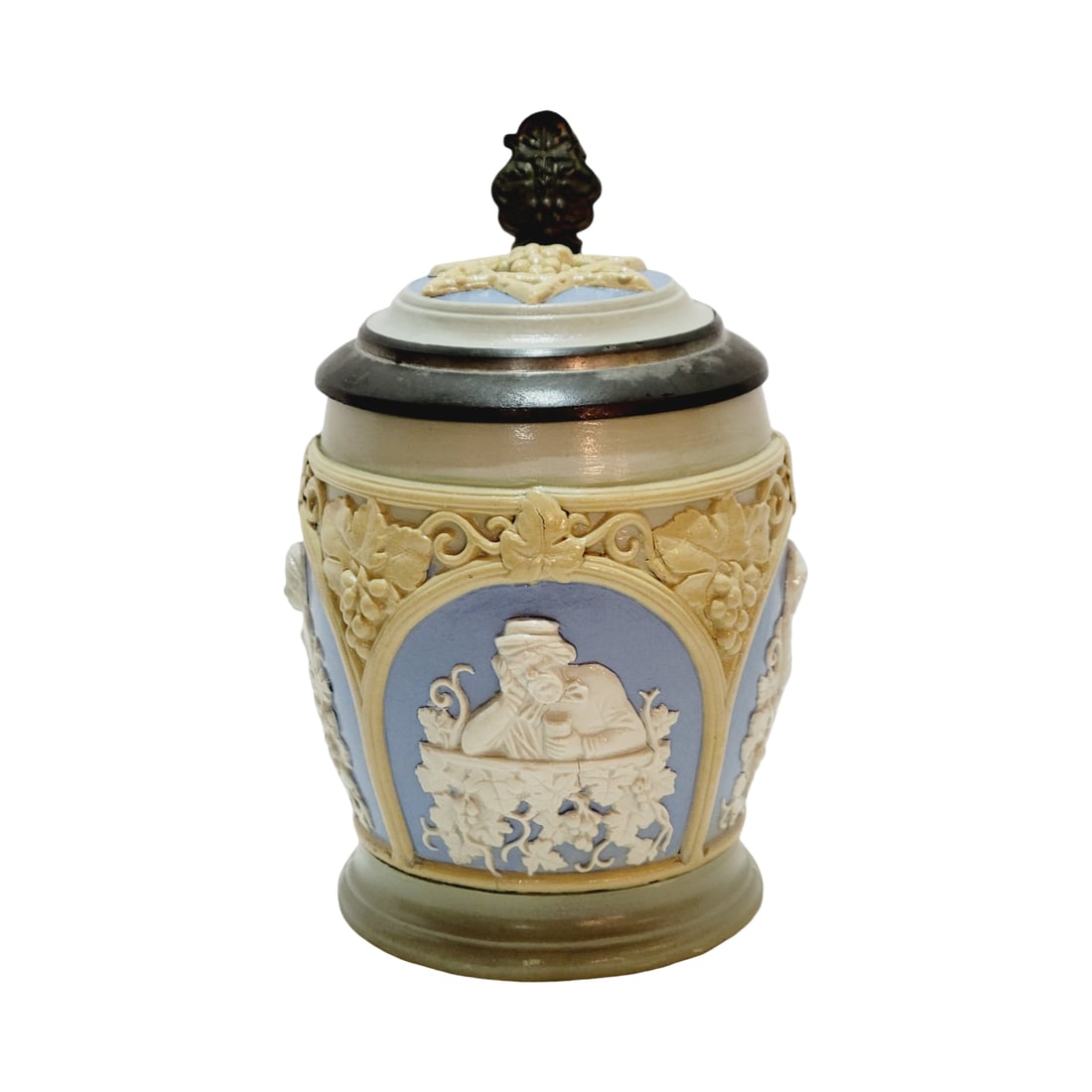 Mettlach Stein #1266, German Beer Stein, Drinking Scenes: 1/2 Liter stoneware in relief, blue background with stoneware inlay lid, design attributed to Ludwig Foltz II, circa 1875