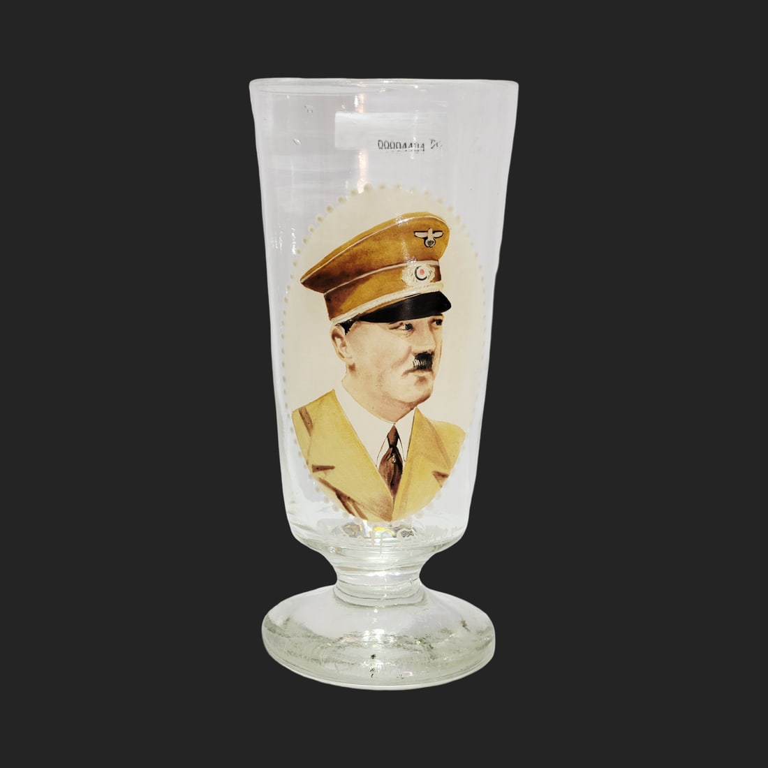 Beer Glass, German Beer Glass, Adolf Hitler Portrait Glass: 8.0" Tall by 3 1/2" Wide blown heavy colorless glass with impurities, hand enameled portrait and swastika, applied glass foot, uncommon piece, circa 1930's