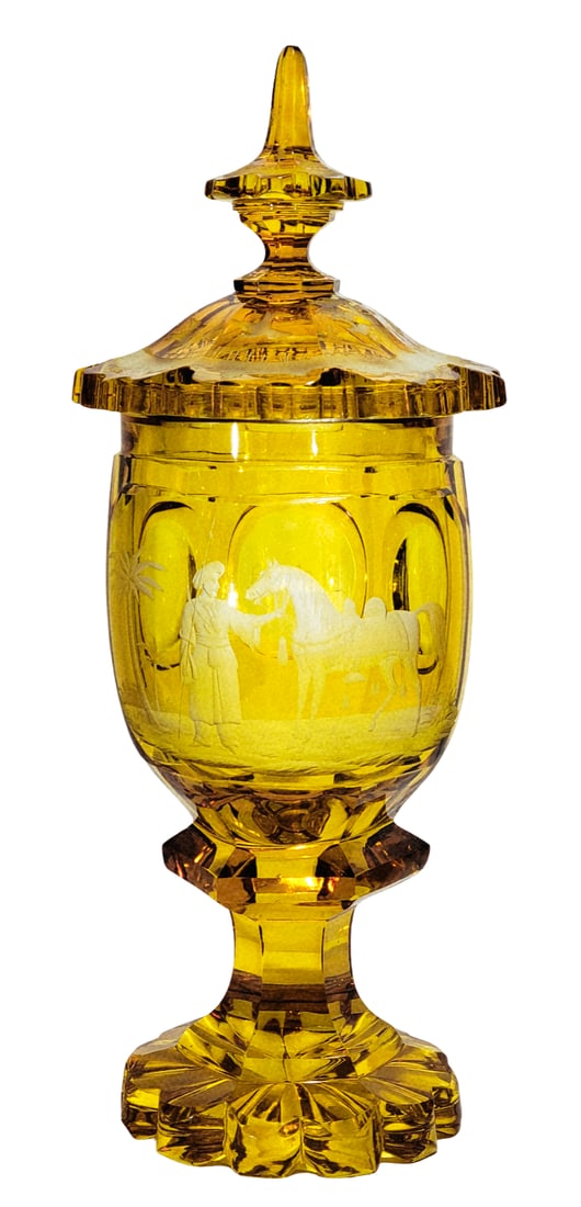 Franz Hansel Pokal, Bohemian Pokal, Arabian with His Horse: 13 3/4" Tall by 5 1/2" Wide heavy clear glass amber stained wheel engraved scenes within a raised panel, 3 raised medallions 1 with the initials J.A.P., Stem and bowl cut with 6 facets leading to a fl