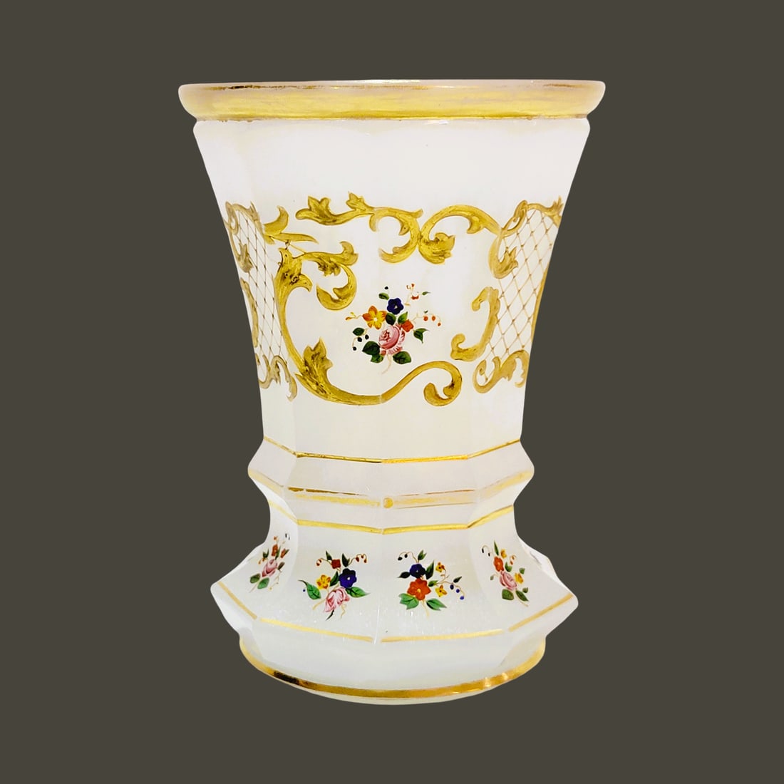 Glass Beaker, Bohemian Glass Beaker, Alabaster Glass Beaker: 5.0" Tall by 3 1/2" Wide blown white alabaster textured glass, hand enameled florals among pasty gold gilding, 9 facets underneath a rounded gilded rim with 2 gilded ribs to a gilded star cut base, ci