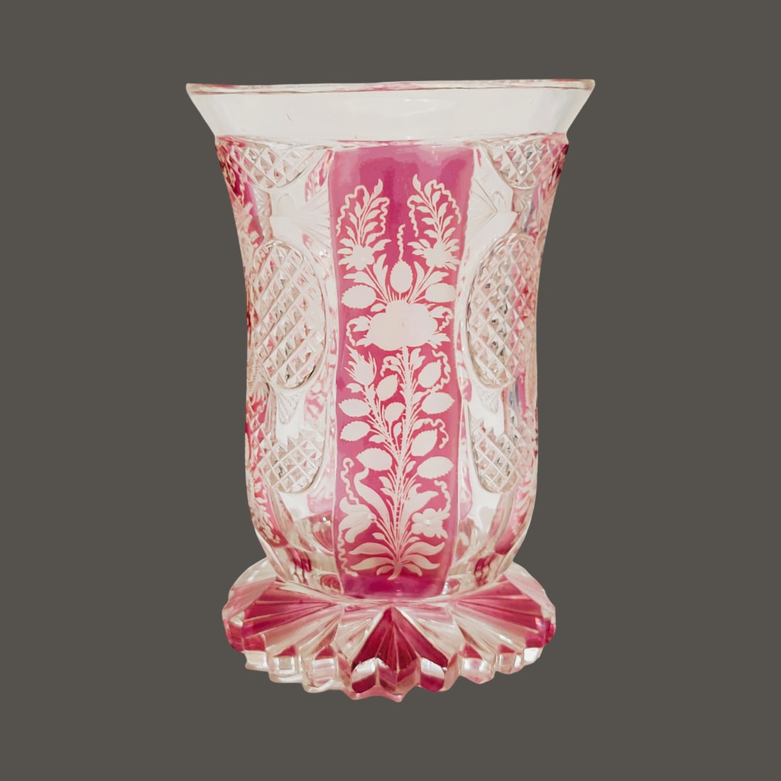 Freiderich Egermann Glass Beaker, Bohemian Glass Beaker, Heavy Footed Beaker: 4 7/8" Tall by 3 1/4" Wide blown clear colorless glass with alternating pink staining within 8 facets engraved with beautiful florals and oval panels with diamond cuts, beveled polished flared rim and