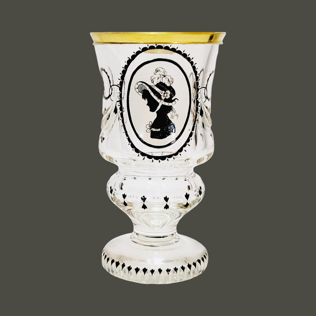 Silhouette Glass, Bohemian Glass, Portrait Glass,: 6 3/4" Tall by 3 3/4" Wide heavy blown colorless glass with a few very small bubbles, incised cut gold gilded flared rim above wheel cut drapery between very fine diamond cutting, hand enameling in bl