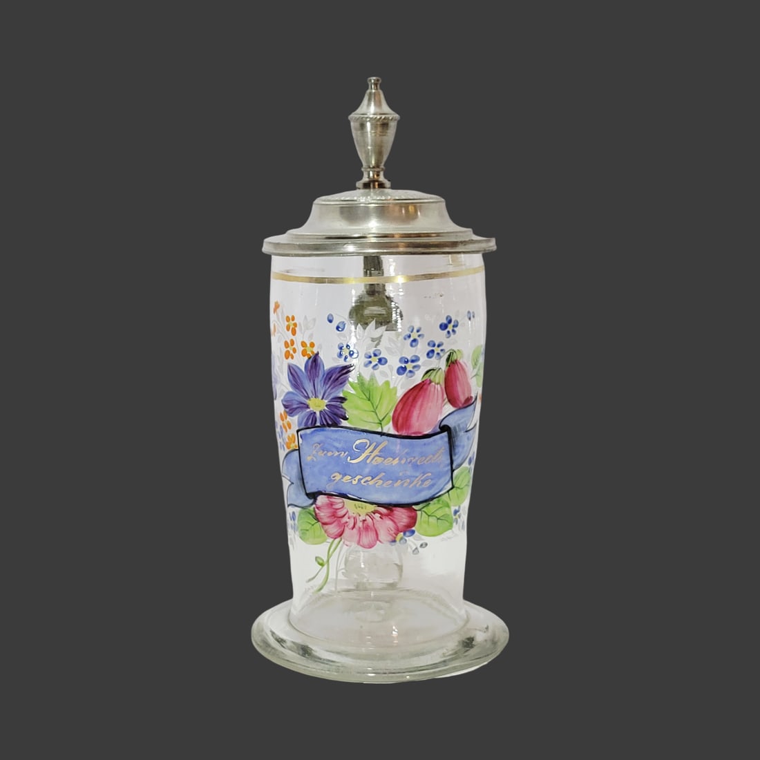 Biedermeier Pedestal Stein, Bohemian Beer Stein, Friendship Stein: 0.5 Liter blown colorless glass with bubbles and impurities, hand enameled florals and reverse enameling as well on tapered body with flared base, has nice pontil, nice engraved pewter lid dated 1853