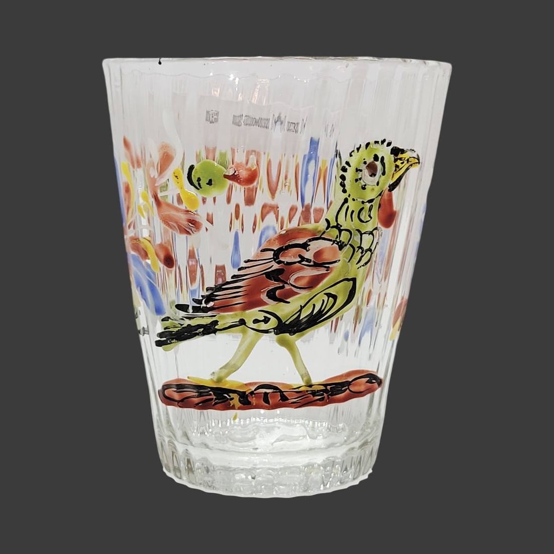 Biedermeier Period Beaker, Bohemian Beaker, Bird with Florals: 3 3/4" Tall by 3 1/8" Wide hand blown colorless tapered glass with small impurities, very colorful busy hand enameling of the bird and florals, base with nice pontil, circa mid 1700's