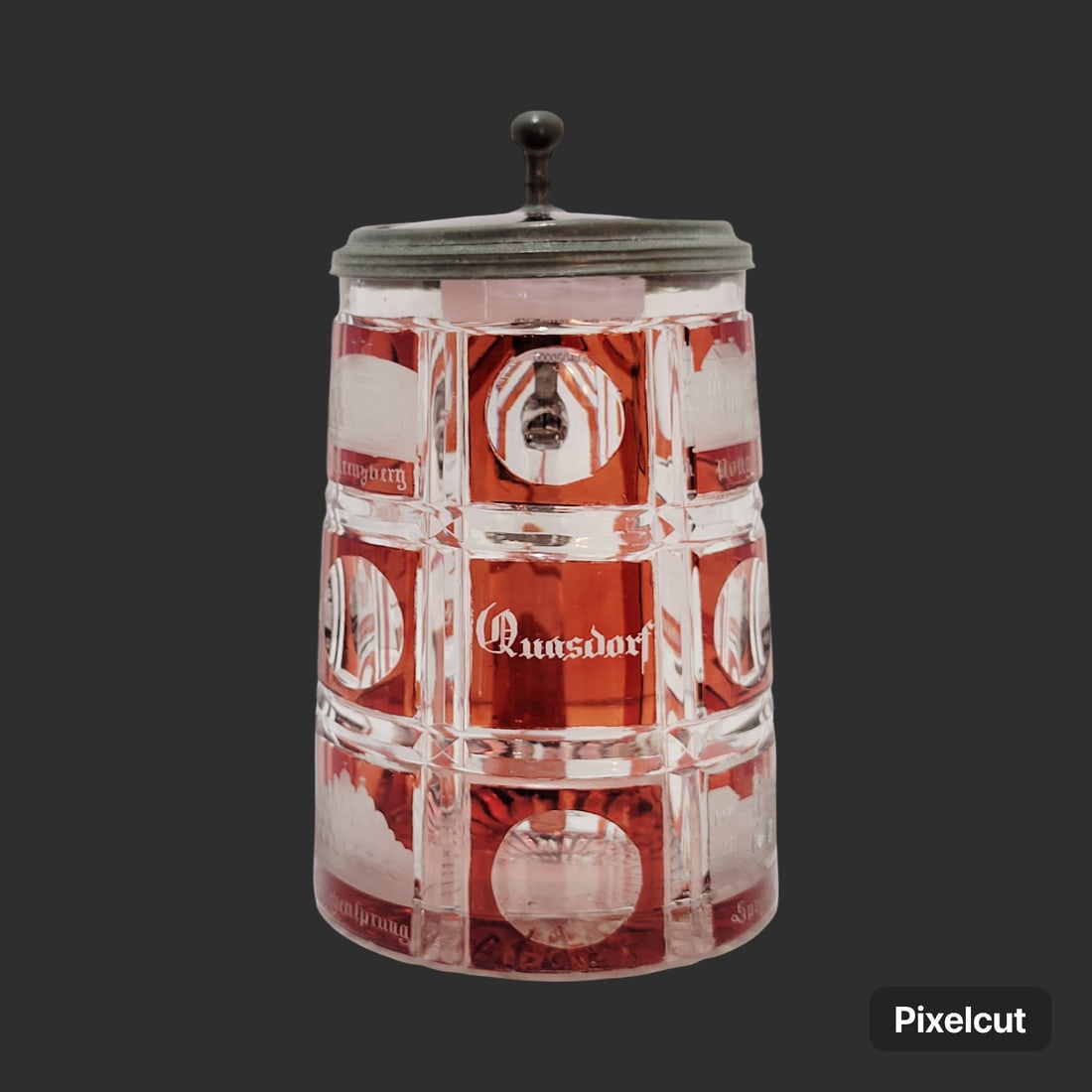 Glass Stein, Bohemian Beer Stein, Ruby Spa Glass: 0.3 Liter blown clear colorless glass ruby stained with deep vertical and horizontal wheel cuts that divide the stein into squares with ovals and wheel cut spa houses, base is nicely wheel cut, has ru