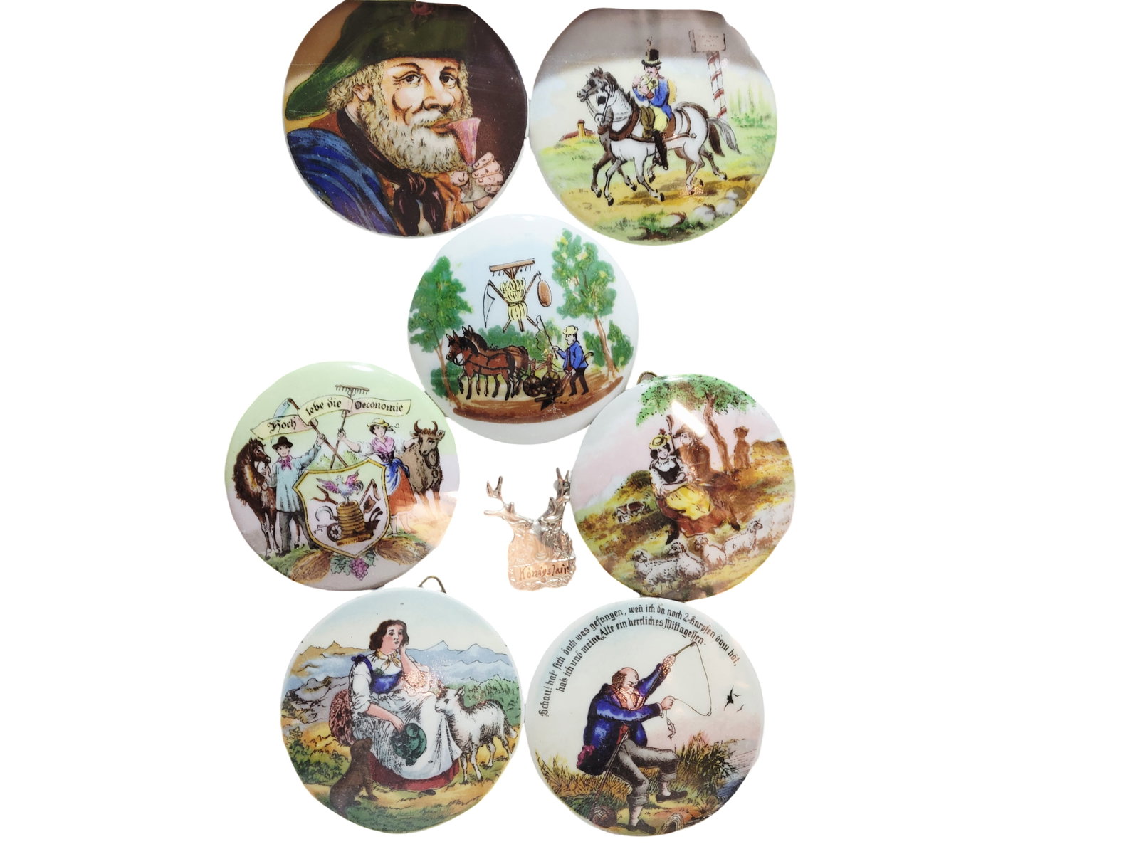 Framed Porcelain, German Porcelain Inlay Lids, Set of Seven Inlay Lids: 12.0" Long by 10.0" Wide frame size featuring 7 hand painted porcelain inlay lids of various themes nicely mounted in a frame, circa late 1890's to early 1900's