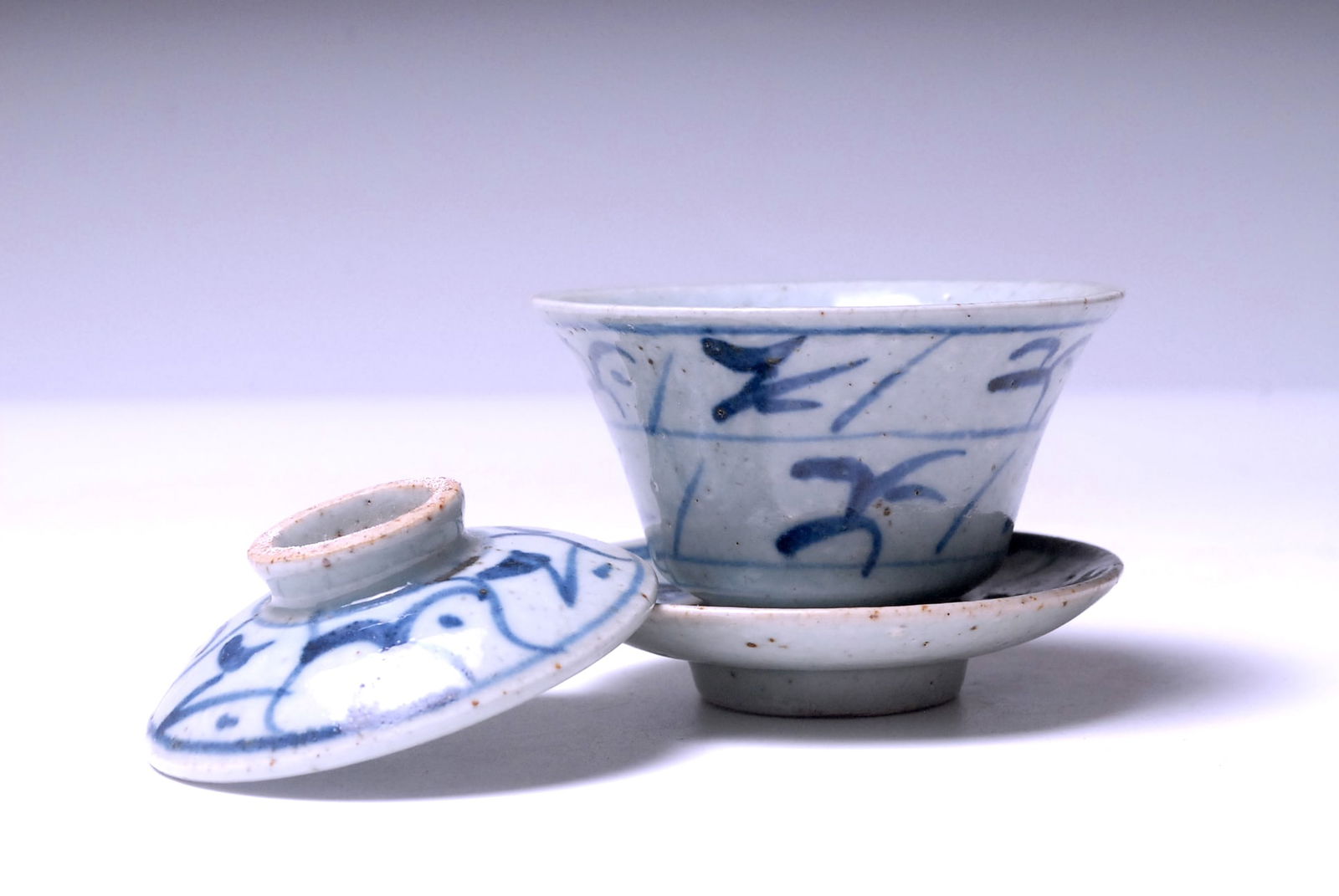 Blue and White Cup: Chinese Antique Blue and White Tea Cup Chinese Antique Blue and White Tea Cup with cap, cup and plate. Size: 9.3 x 7.3cm You can contact us 24/7 via Whatsapp at (+60)17-6520838 or through liveauctione