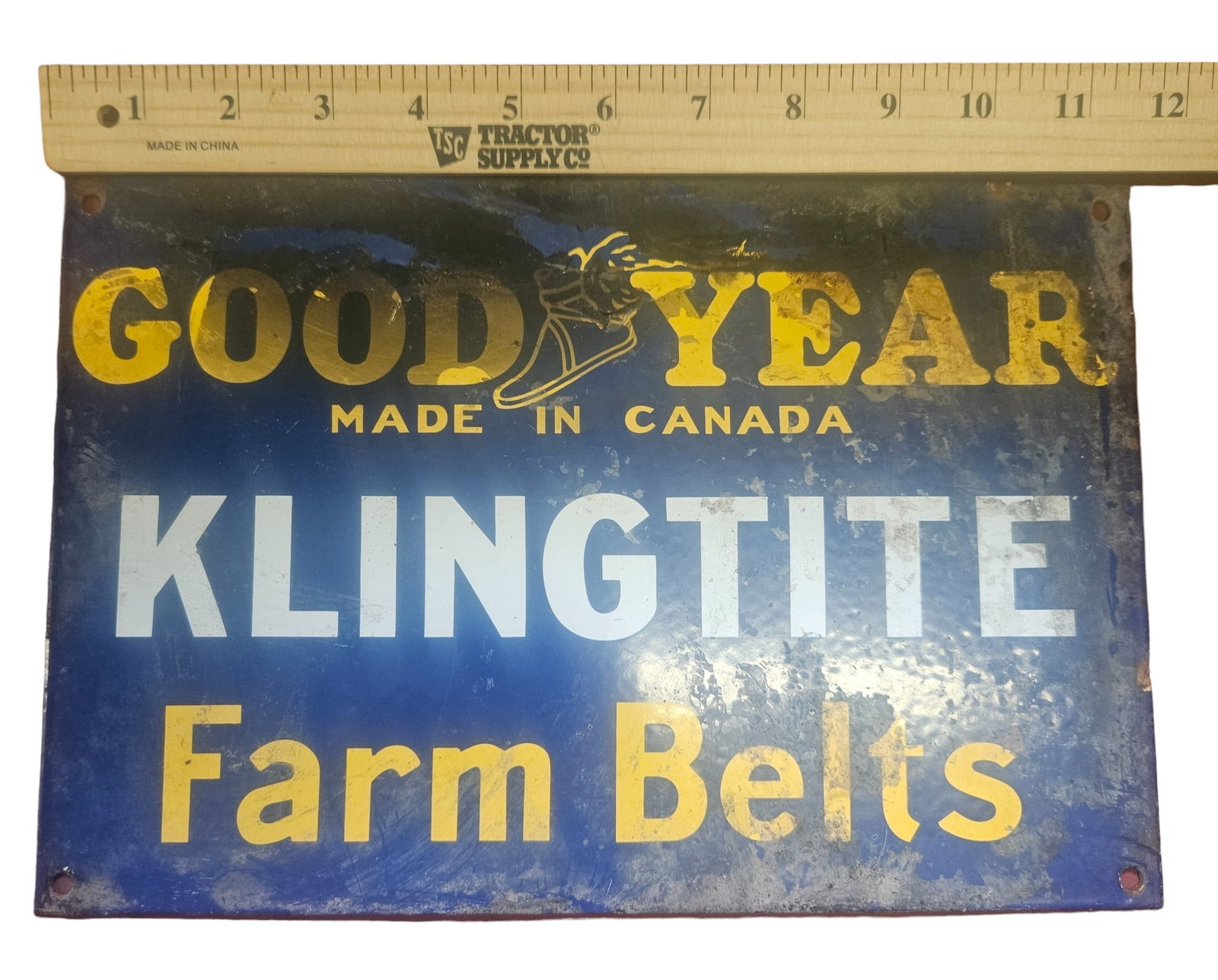 Vintage Goodyear Klingtite Farm Belts Porcelain Sign - Made in Canada: This antique Goodyear Klingtite Farm Belts porcelain sign is a must-have for collectors of vintage agricultural memorabilia. Made in Canada, this sign measures approximately 12" x 8" and features clas